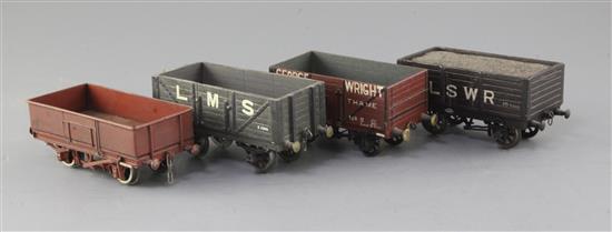 A George Wright open truck 8T, no.5, in red, an LMS open truck 8T, no.1234, in grey, a steel side timber